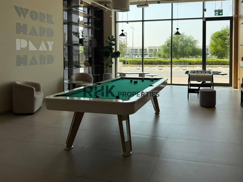 13 Landscaped park and residential buildings in Town Square Dubai community