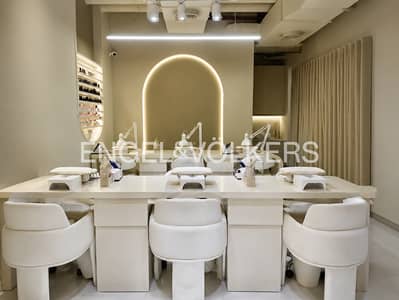 Shop for Sale in Jumeirah Village Circle (JVC), Dubai - Investor Deal | Rented Salon | High ROI