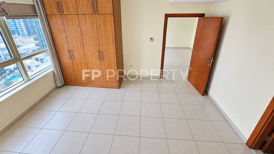 4 Bright Minimalist Room with City View. png