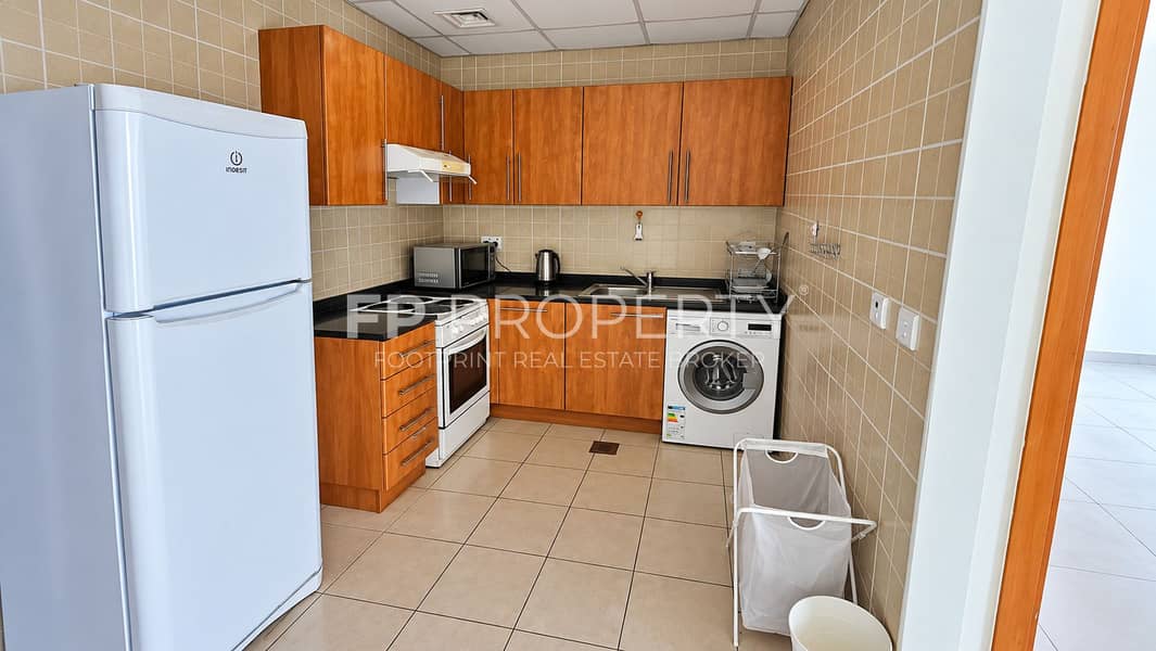5 Bright Modern Kitchen with Wood Cabinets. png