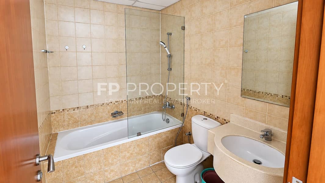 8 Modern Beige Tiled Bathroom Interior. png