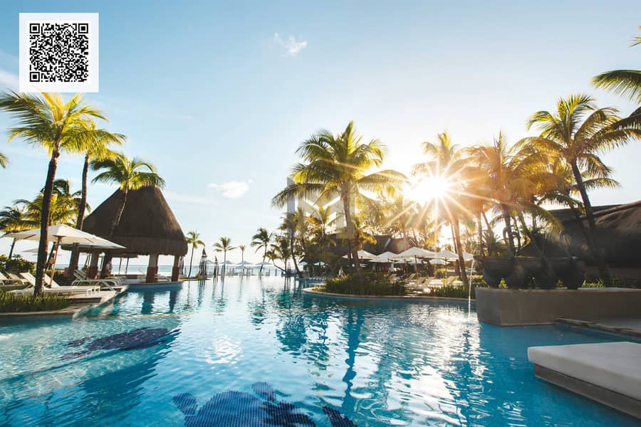 12 swimming-pool-among-palm-trees-on-a-tropical-islan-2022-02-12-05-47-40-utc_qr. jpg