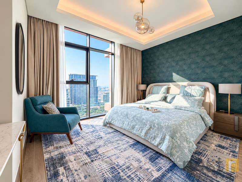 7 Sunlit Teal Bedroom with City Views. png