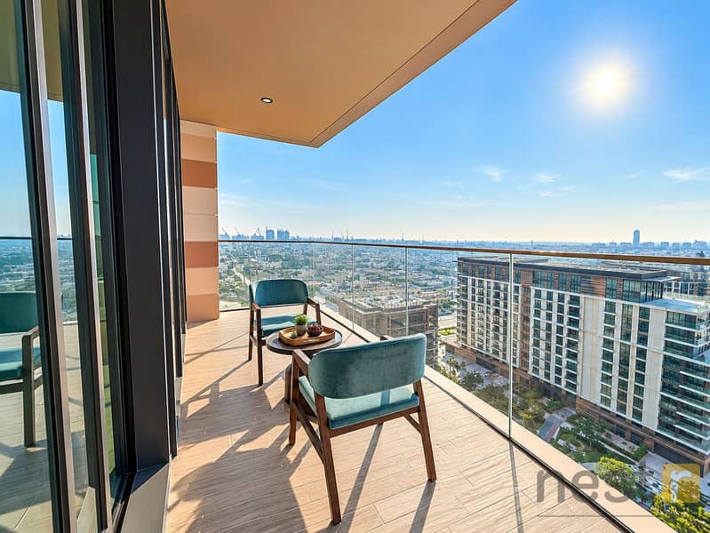 18 Sunlit High-Rise Balcony Overlooking the City. png
