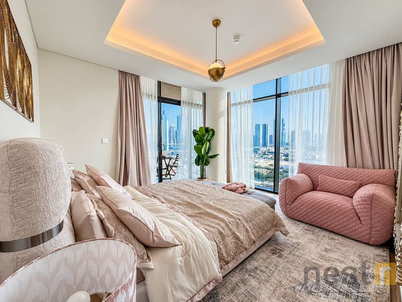 6 Luxurious Blush Bedroom with Skyline Views. png