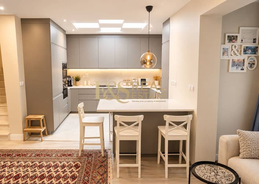 2 Warm Modern Kitchen and Living Space. png