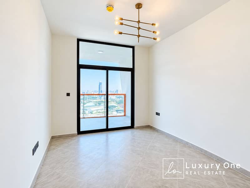 3 Bright Minimalist Room with City Balcony View. png
