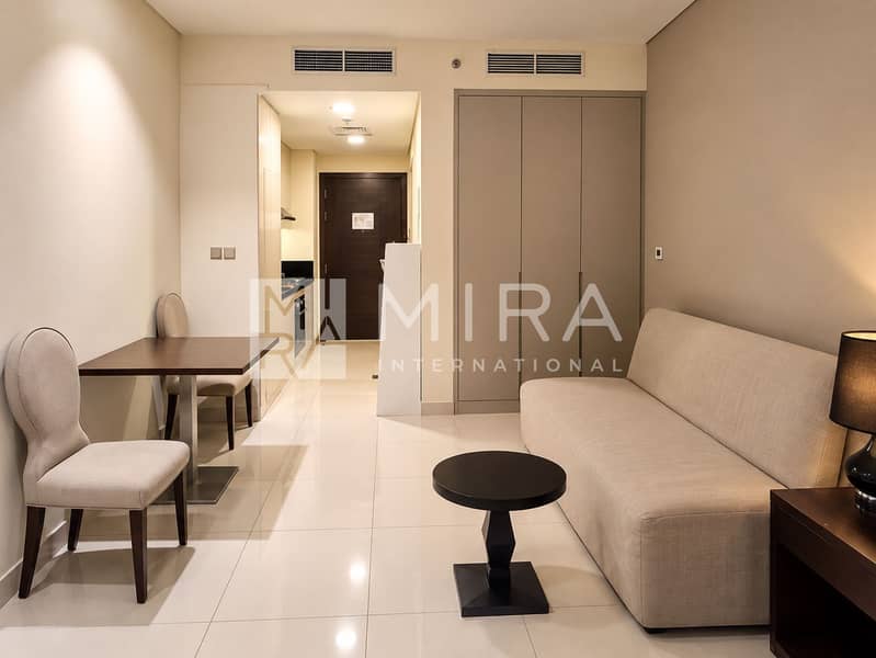 7 Brightened apartment interior with nighttime views-1