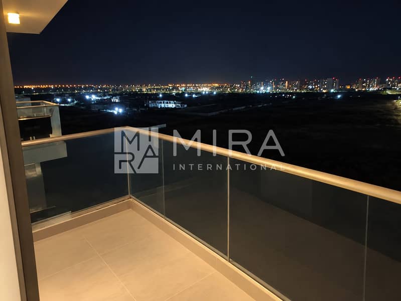 15 Night balcony overlooking distant lights-3
