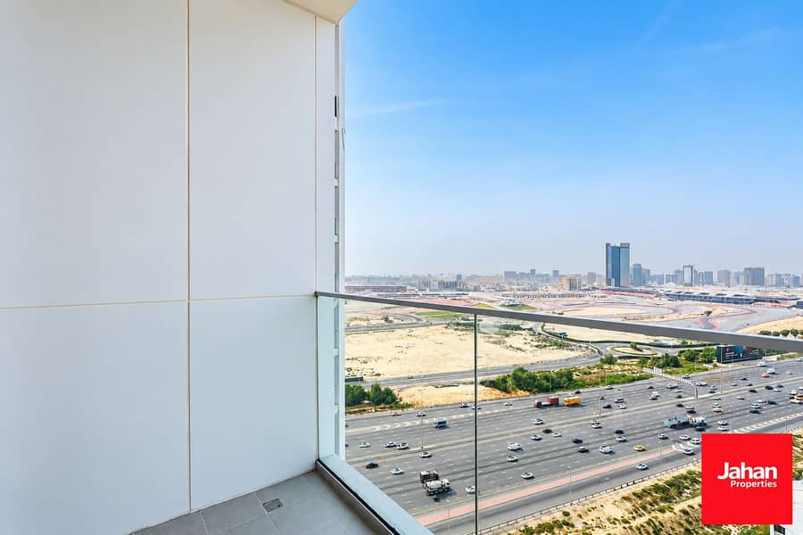 3 Modern Balcony Overlooking City Highway. png