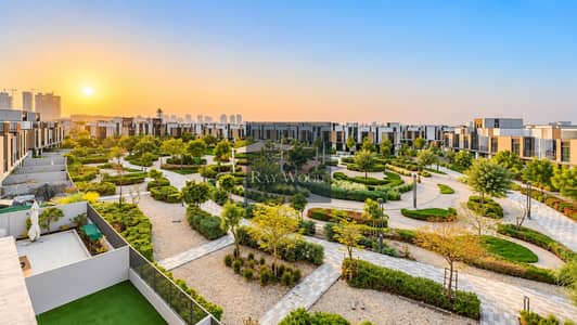 3 Slaapkamers Townhouse te Koop in Mudon, Dubai - Sunrise Over a Modern Garden Community. png