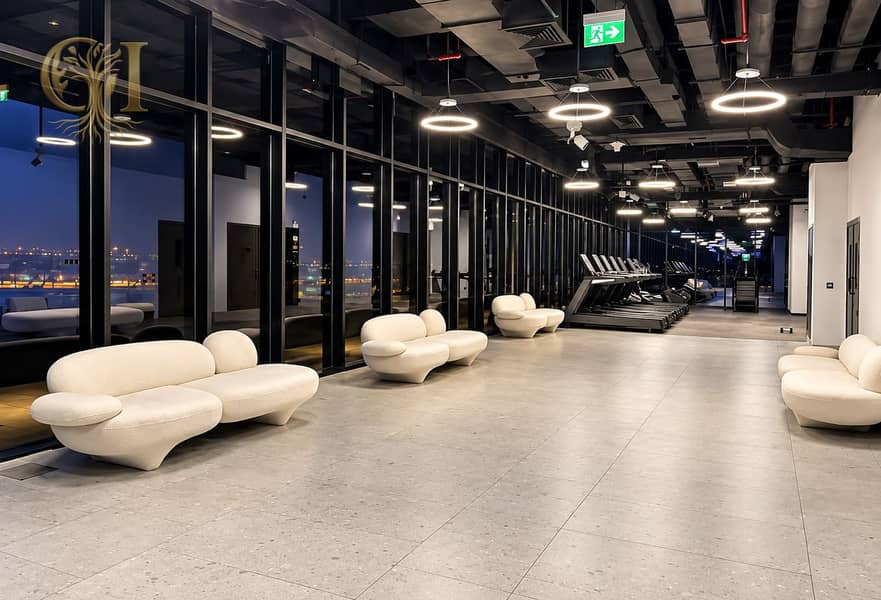 13 Modern Gym Lounge at Night. png