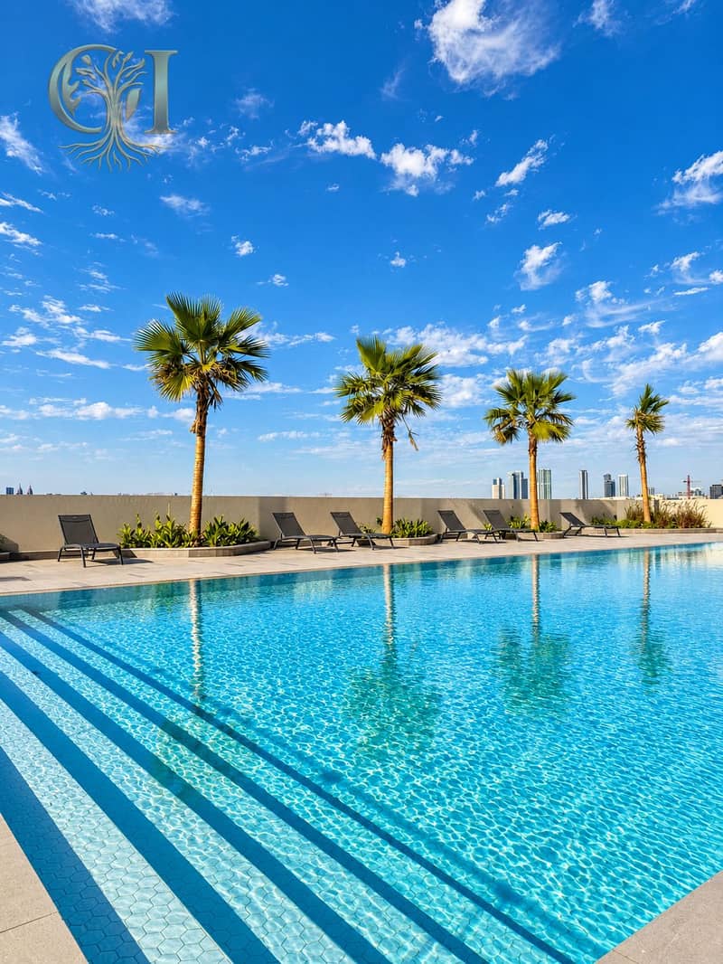 9 Sunlit Rooftop Pool Overlooking the Skyline. png