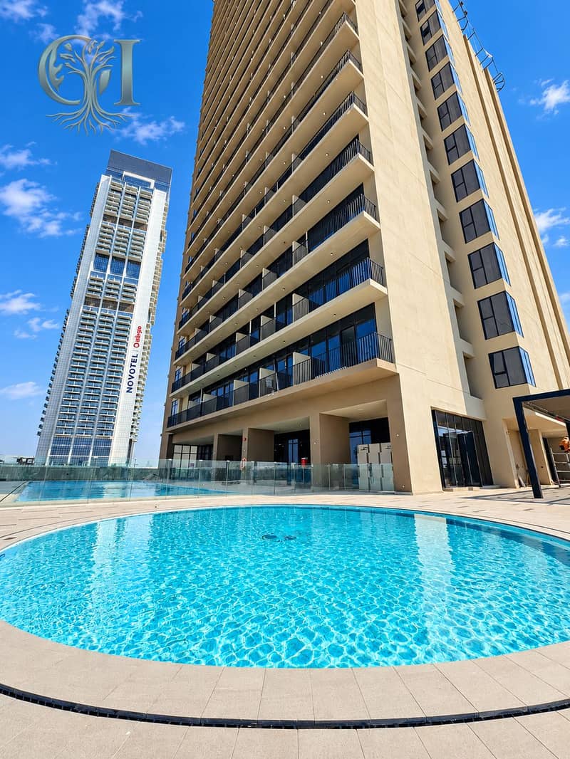 10 Rooftop Pool Beneath Modern Towers. png