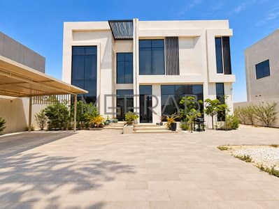 5 Slaapkamers Villa te Huur in Dubailand, Dubai - Modern Desert Villa Facade. png 5 Slaapkamers Villa te Huur in Dubailand, Dubai - Modern Desert Villa Facade. png