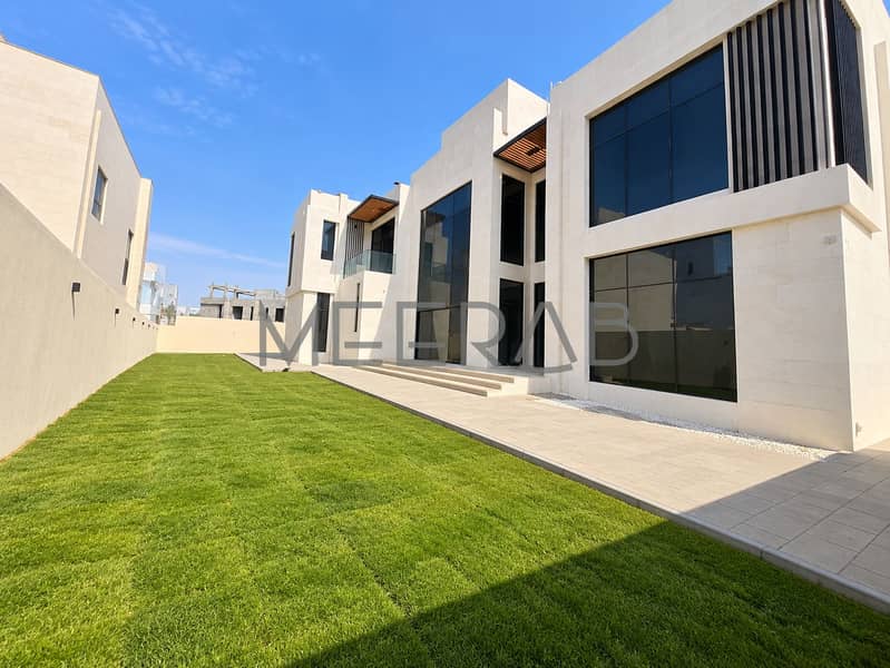 2 Modern Villa with Lush Lawn. png