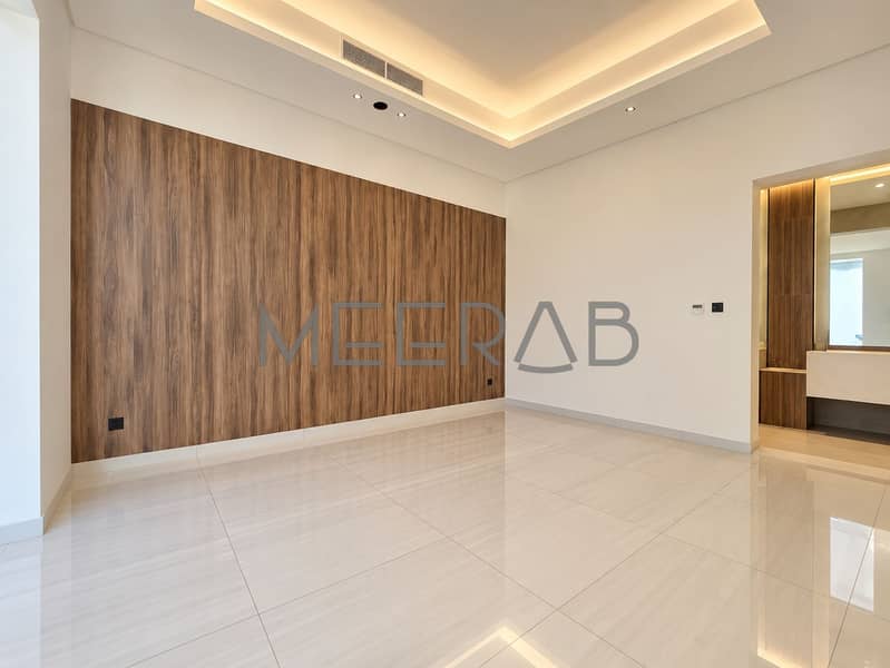 5 Empty Modern Room with Warm Wood Accent. png