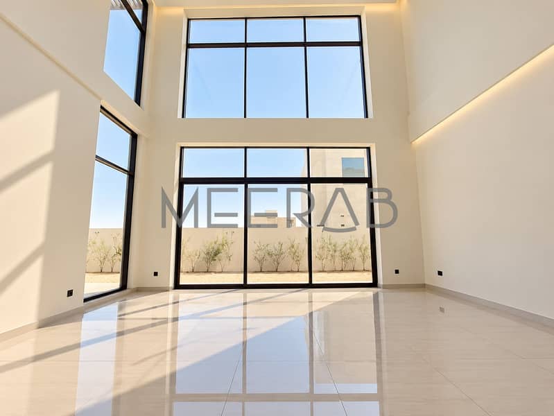 7 Sunlit Double-Height Minimalist Atrium. png