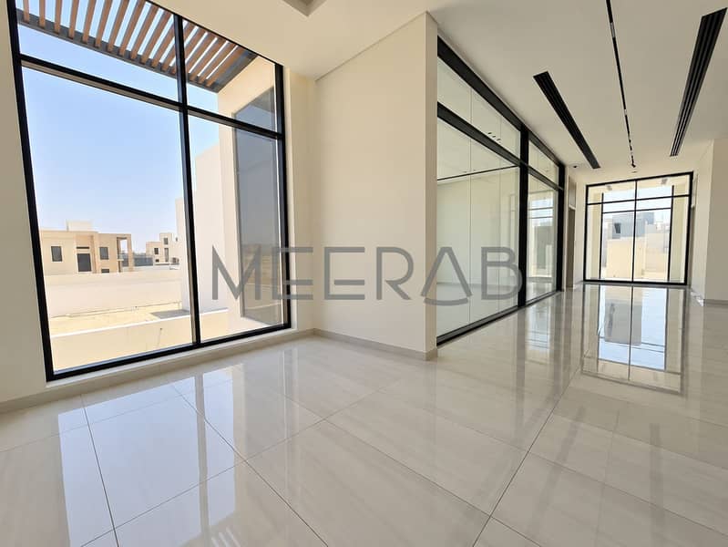 11 Minimalist Sunlit Glass Hallway. png