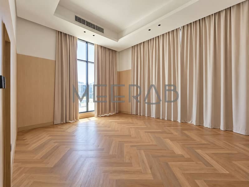 12 Clean Minimalist Room with Herringbone Floors. png