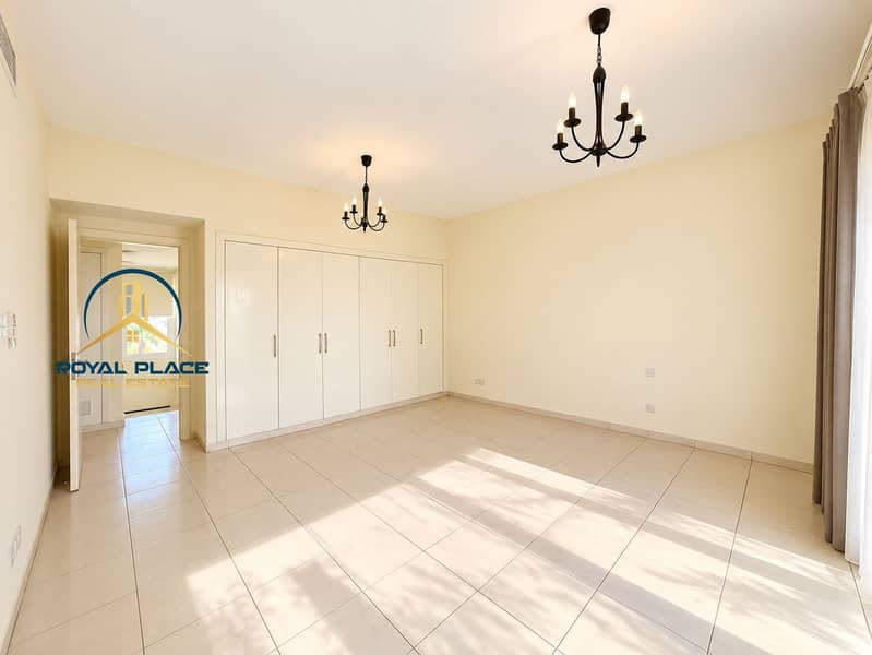 10 Sunlit Empty Bedroom with Chandeliers. png