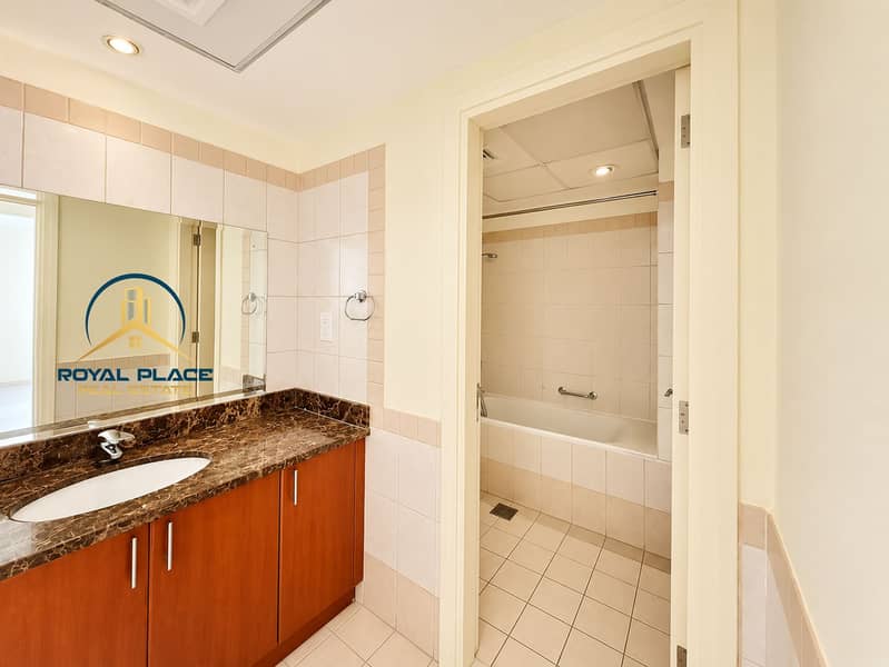 11 Warm Modern Bathroom Vanity and Tub. png