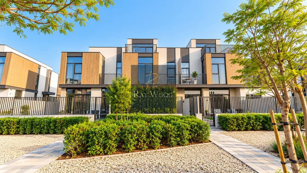 3 Modern Townhouses in a Landscaped Courtyard. png