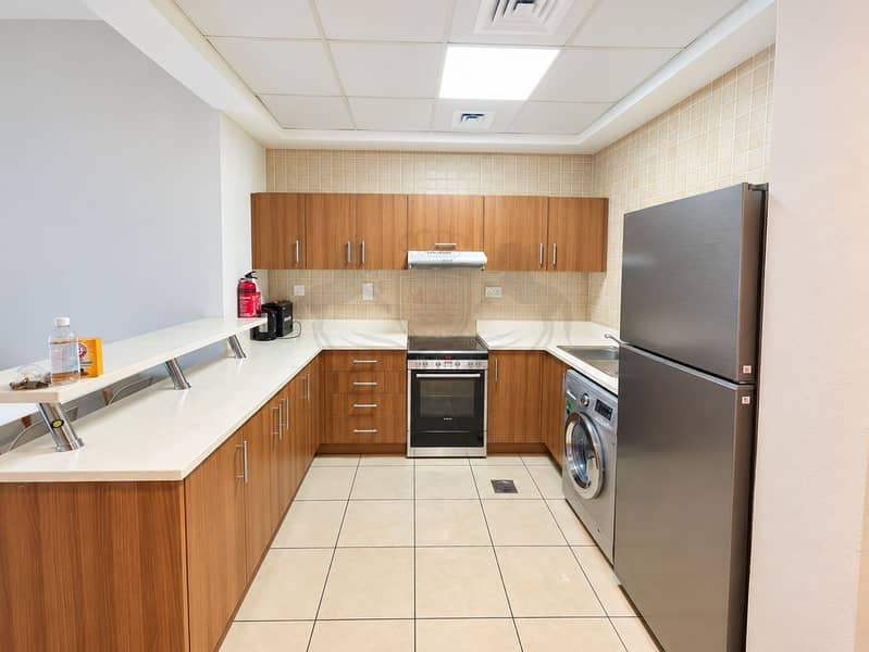 9 Bright Modern U-Shaped Kitchen (1). png