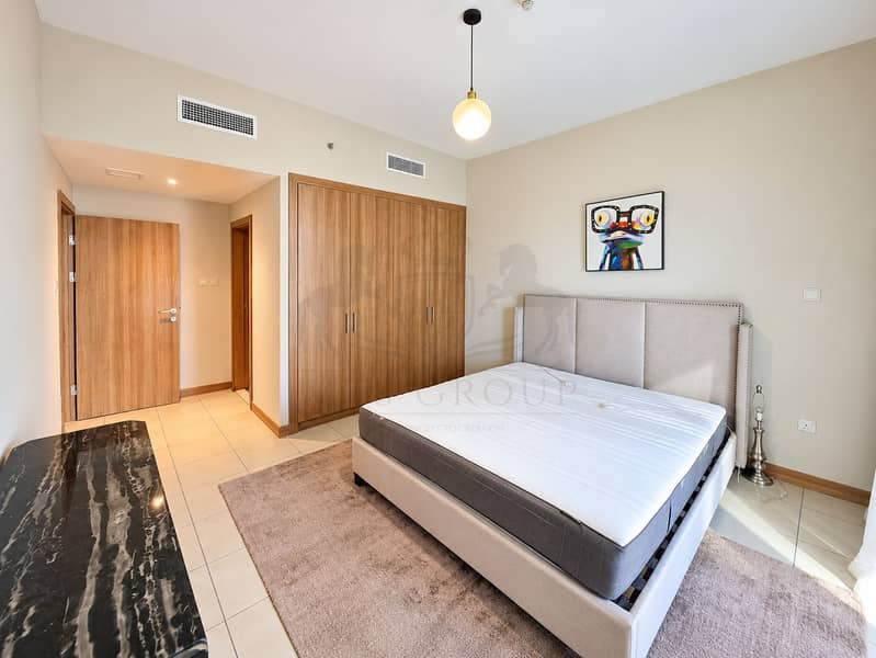 11 Modern Bedroom with Upholstered Bed and Wardrobe. png