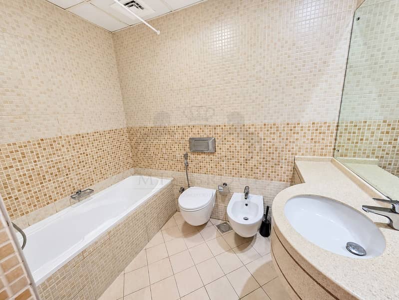 16 Modern Beige Mosaic Bathroom. png
