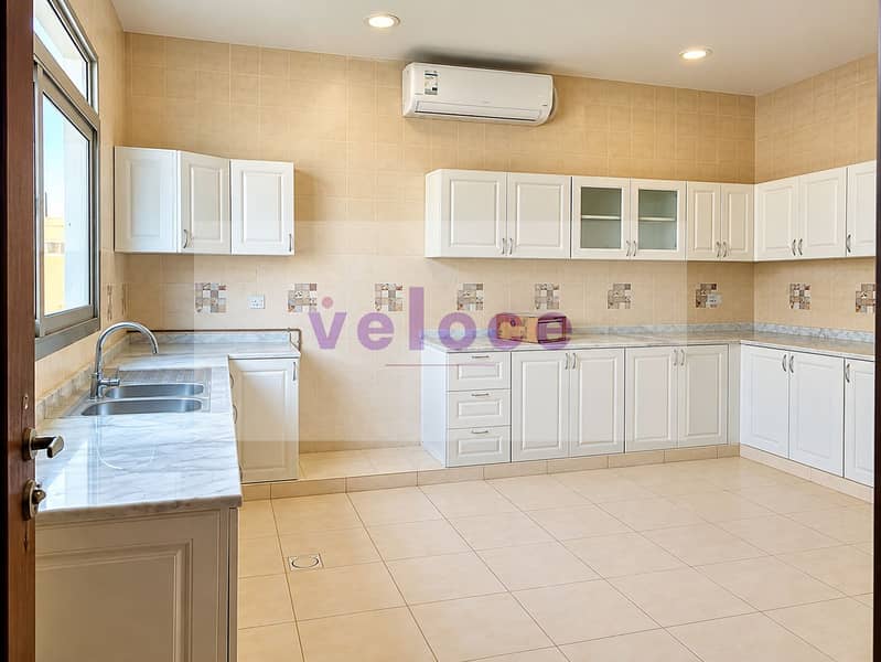 4 Modern Cream-Tiled Kitchen Interior. png