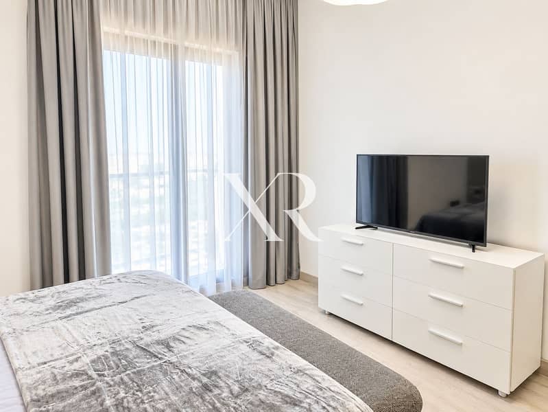 5 Bright Minimalist Bedroom with TV and Drapes. png