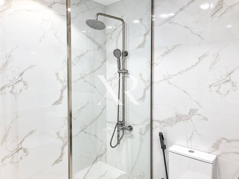 12 Luxurious Marble Shower and Toilet. png