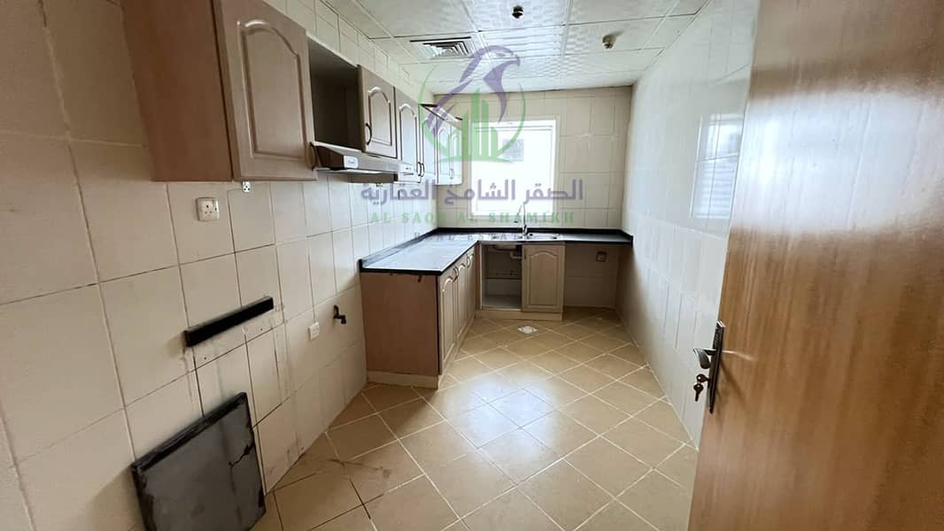13 apartment-for-rent-3-bedroom-altaawn-alsharqh-kitchen-01. jpg