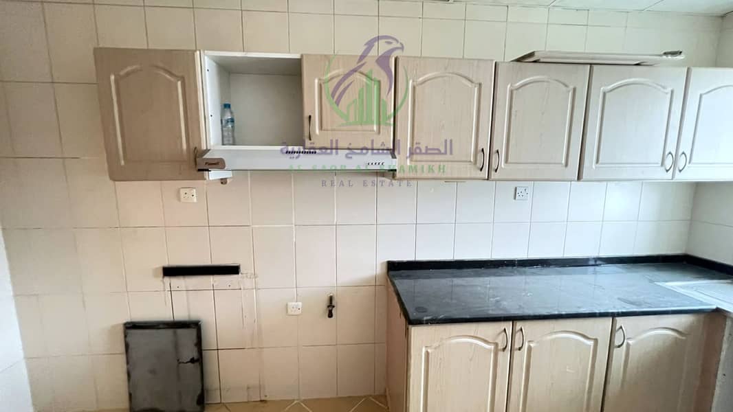 14 apartment-for-rent-3-bedroom-altaawn-alsharqh-kitchen-07. jpg