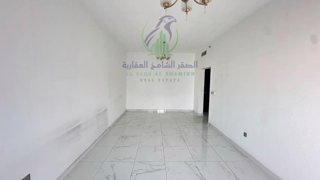 14 apartment-for-rent-2-bedroom-almjaz1-alsharqh-living-room-23. jpg