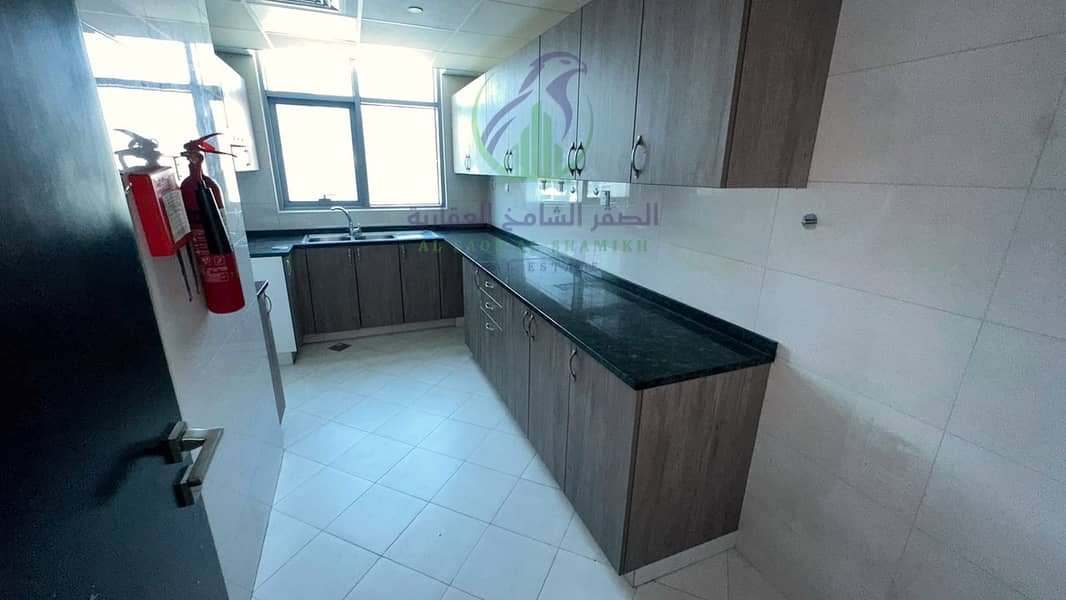 21 apartment-for-rent-2-bedroom-almjaz1-alsharqh-kitchen-19. jpg