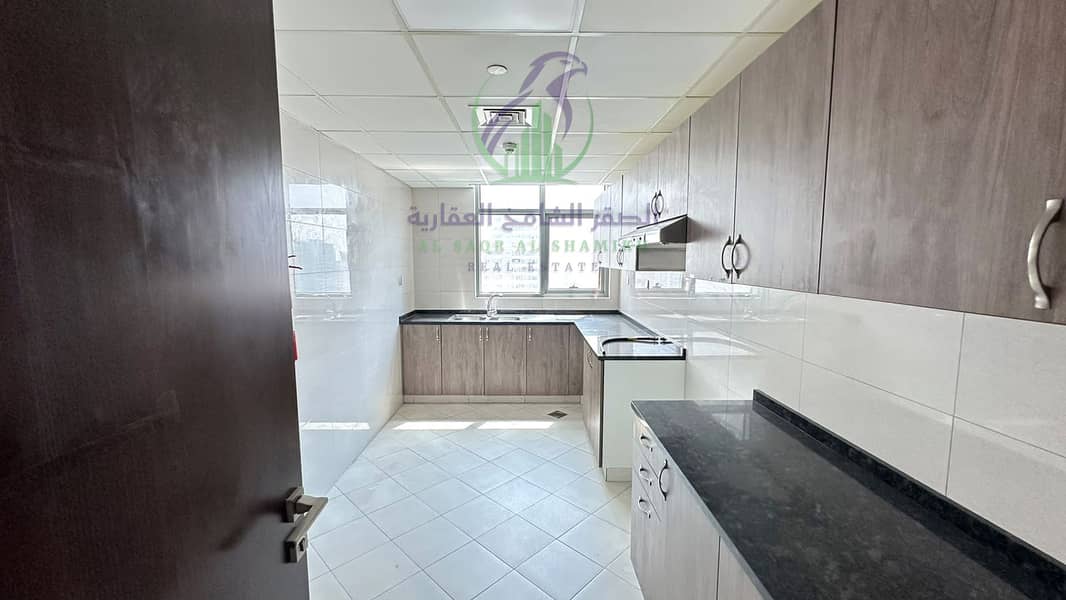 15 apartment-for-rent-3-bedroom-almjaz1-alsharqh-kitchen-24. jpg