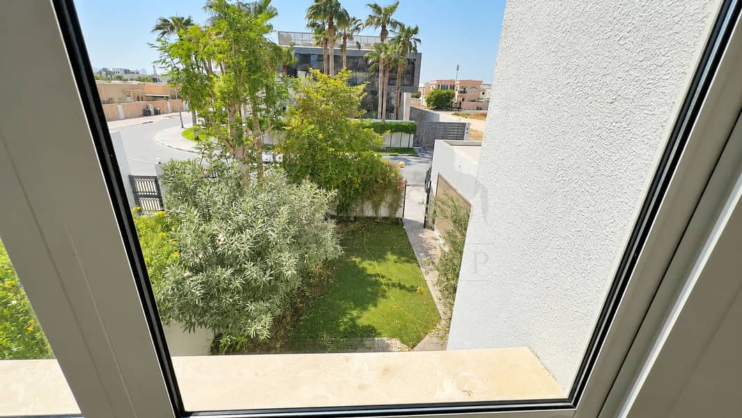 3 Sunny Suburban View Through Window. png