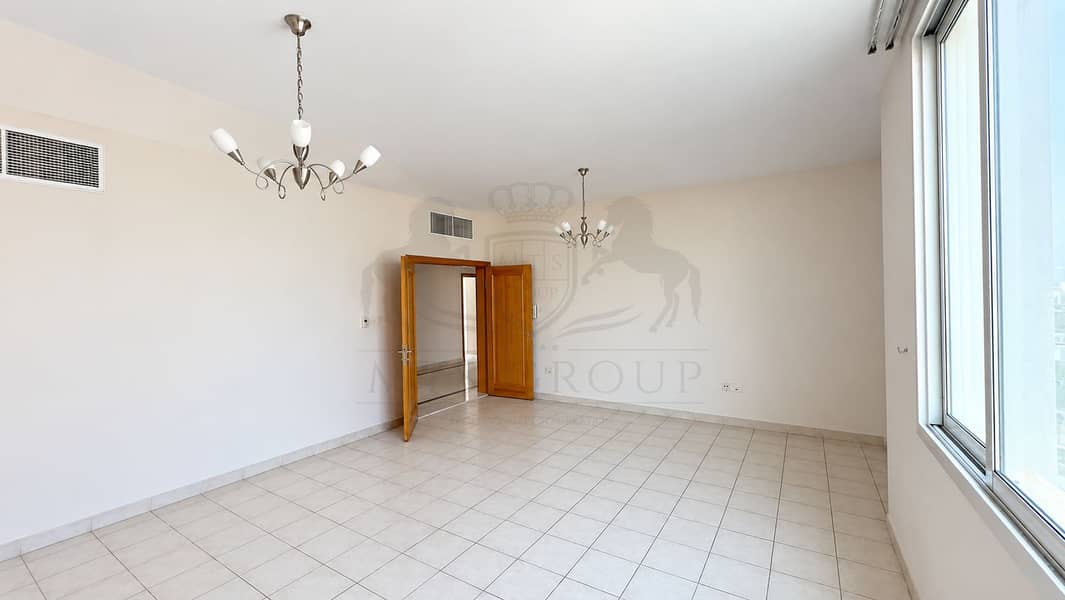 6 Bright Empty Living Room with Open Door. png