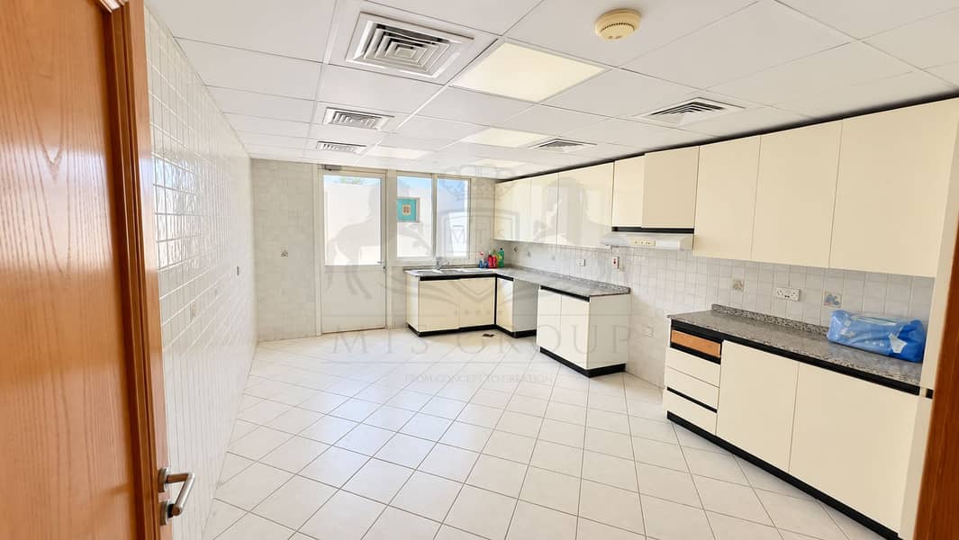 14 Bright Modern Cream-Tiled Kitchen. png