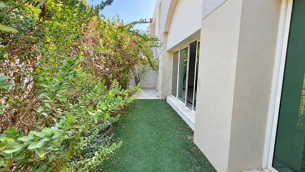 17 Lush Garden Path Beside Modern Home. png