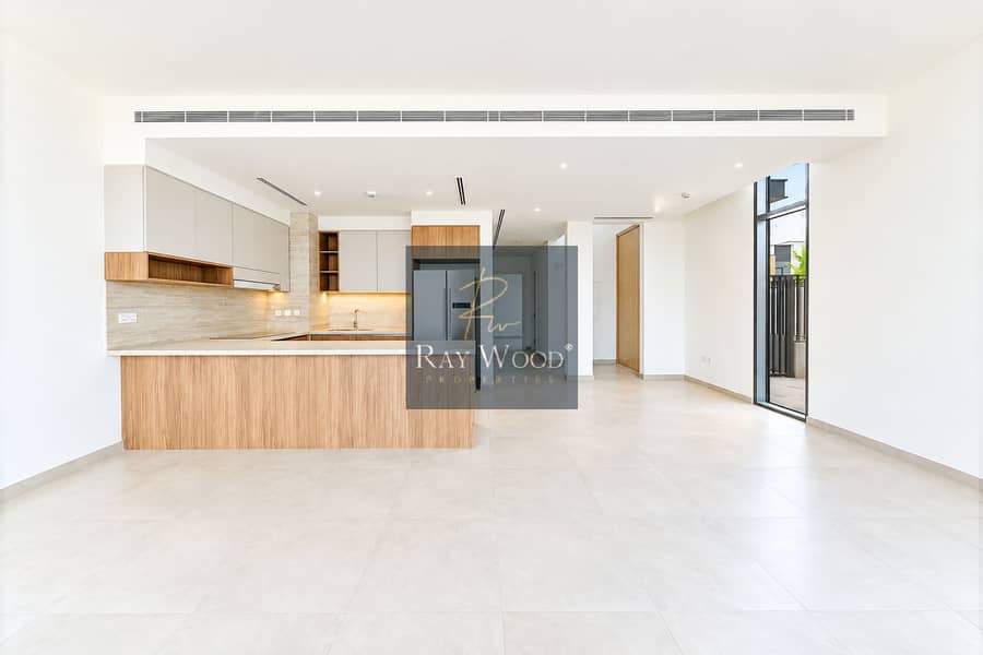 11 Sunlit Minimalist Kitchen and Living Space. png