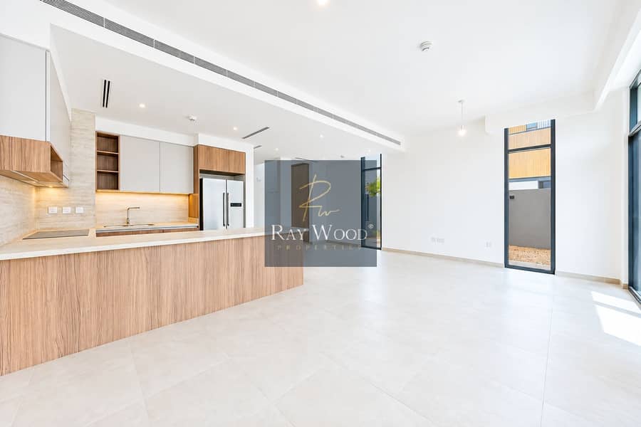 12 Bright Minimalist Open-Plan Kitchen Interior. png