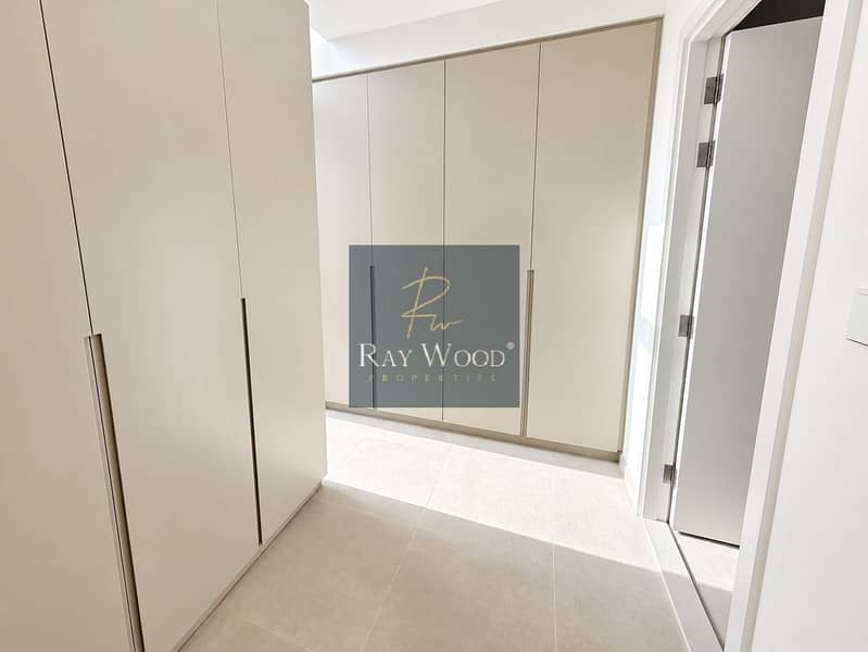 19 Sunlit Minimalist Wardrobe Hallway. png