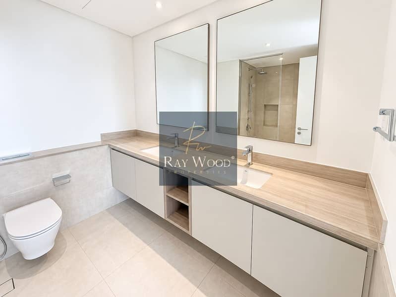 20 Bright Minimalist Double-Vanity Bathroom. png