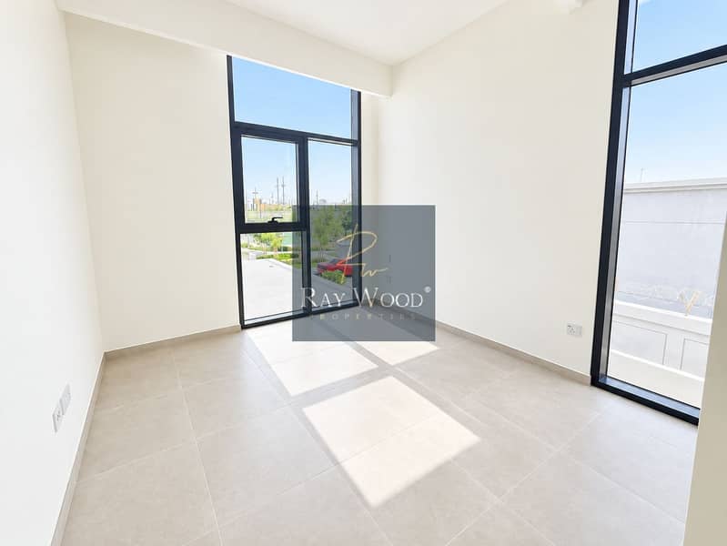 22 Sunlit Minimalist Room with Garden Views. png
