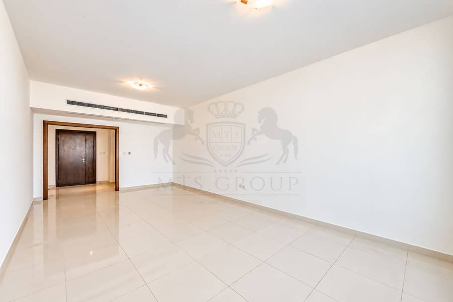 7 Bright Minimalist Interior with Dark Wood Entry Door. png