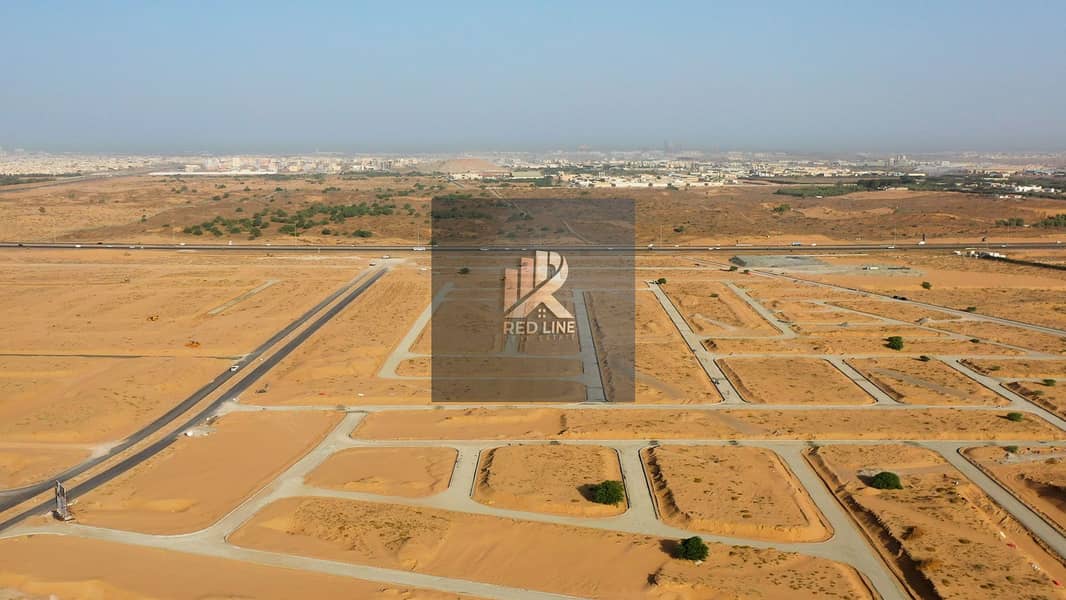 3 Al-Zaheya-Gardens-Aerial-View-of-Main-Layout-ajman-properties. jpg