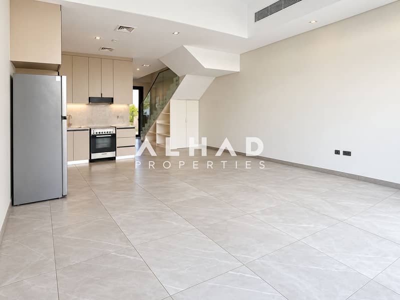 2 Minimalist Townhouse Interior with Kitchen and Staircase. png